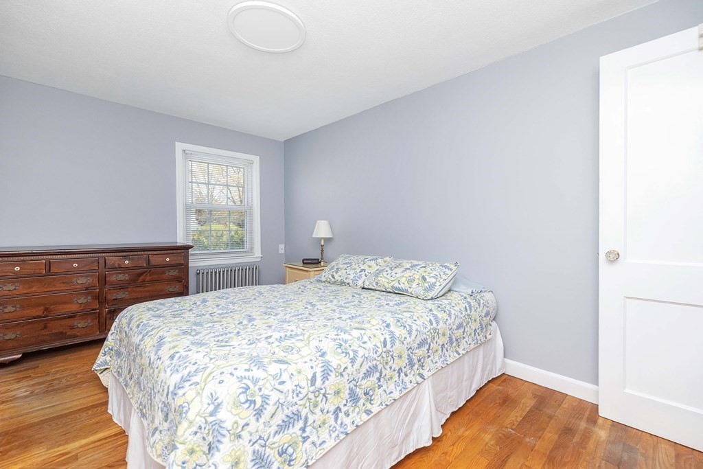 18 Redstone Drive Springfield, MA 01118 - Photo 20 of 31 a bedroom with a bed and window