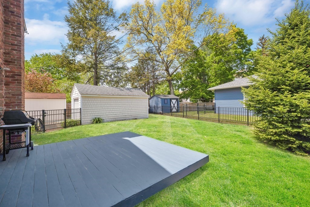 18 Redstone Drive Springfield, MA 01118 - Photo 27 of 31 a view of a backyard with a garden