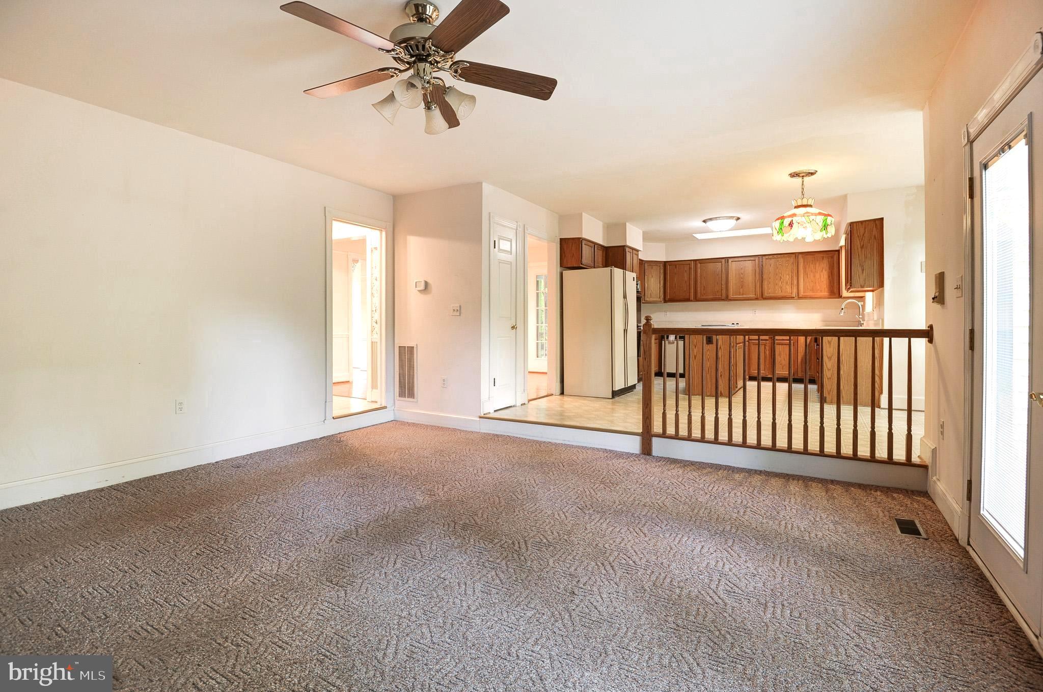 6814 Braddock Road Annandale, VA 22003 - Photo 17 of 68 a view of a hallway with a ceiling fan