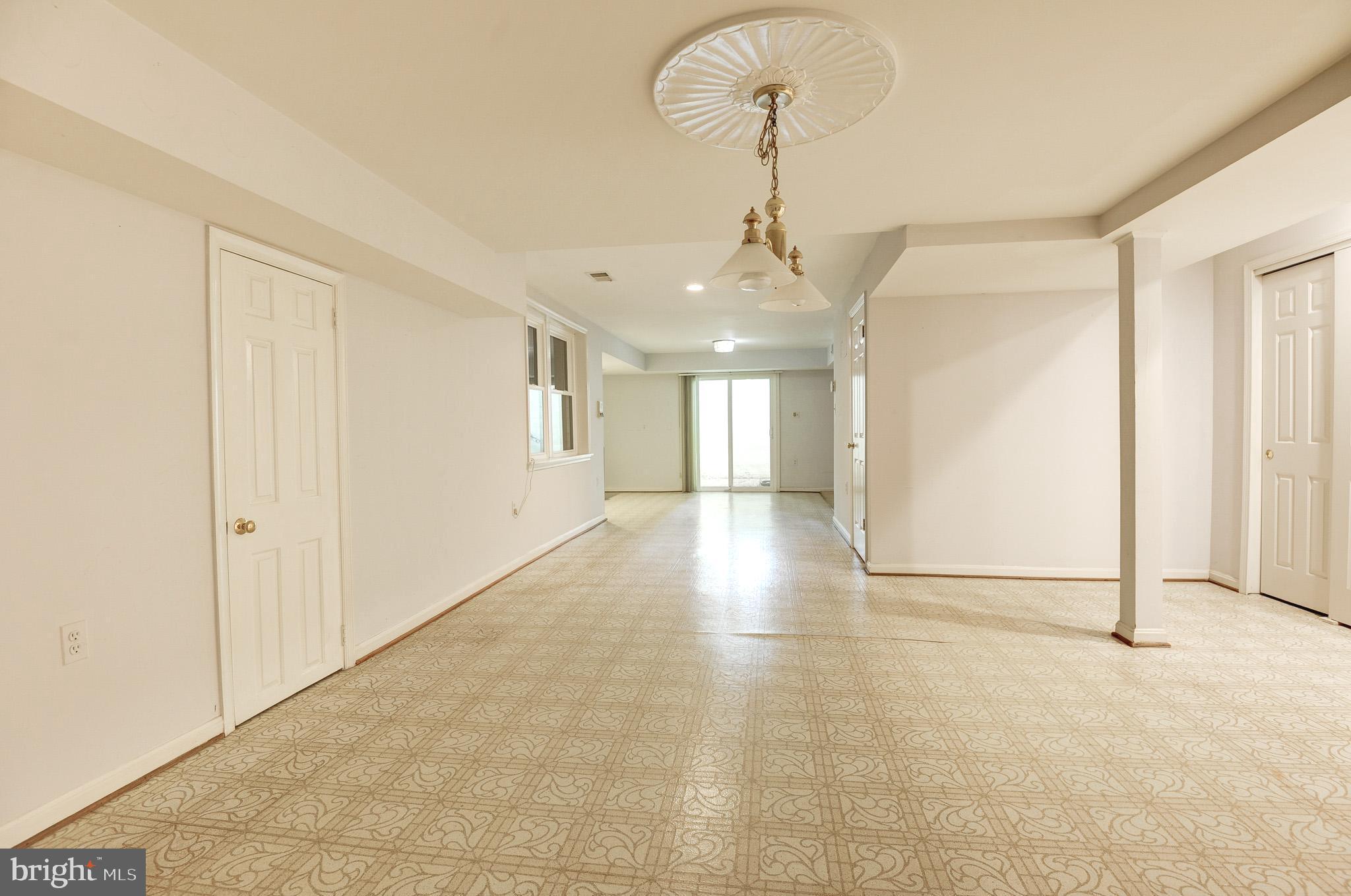 6814 Braddock Road Annandale, VA 22003 - Photo 38 of 68 a view of a livingroom with a chandelier