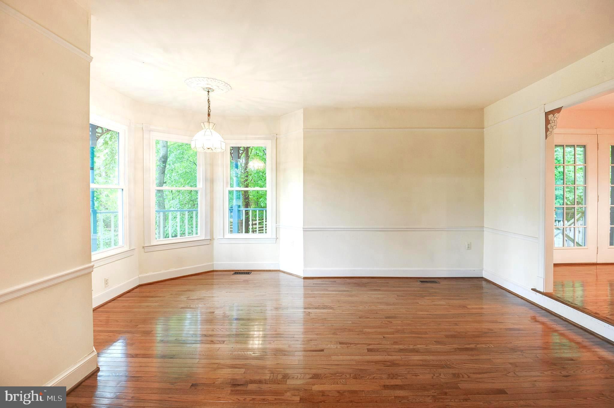 6814 Braddock Road Annandale, VA 22003 - Photo 5 of 68 a view of empty room with wooden floor and fan