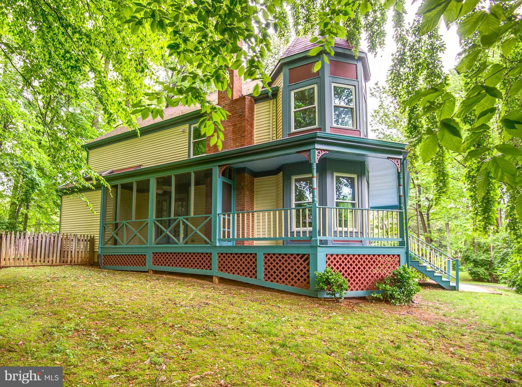 6814 Braddock Road Annandale, VA 22003 - Photo 51 of 68 a front view of a house with a yard
