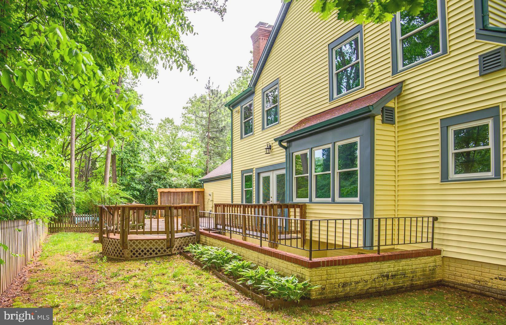 6814 Braddock Road Annandale, VA 22003 - Photo 58 of 68 front view of a house with a yard