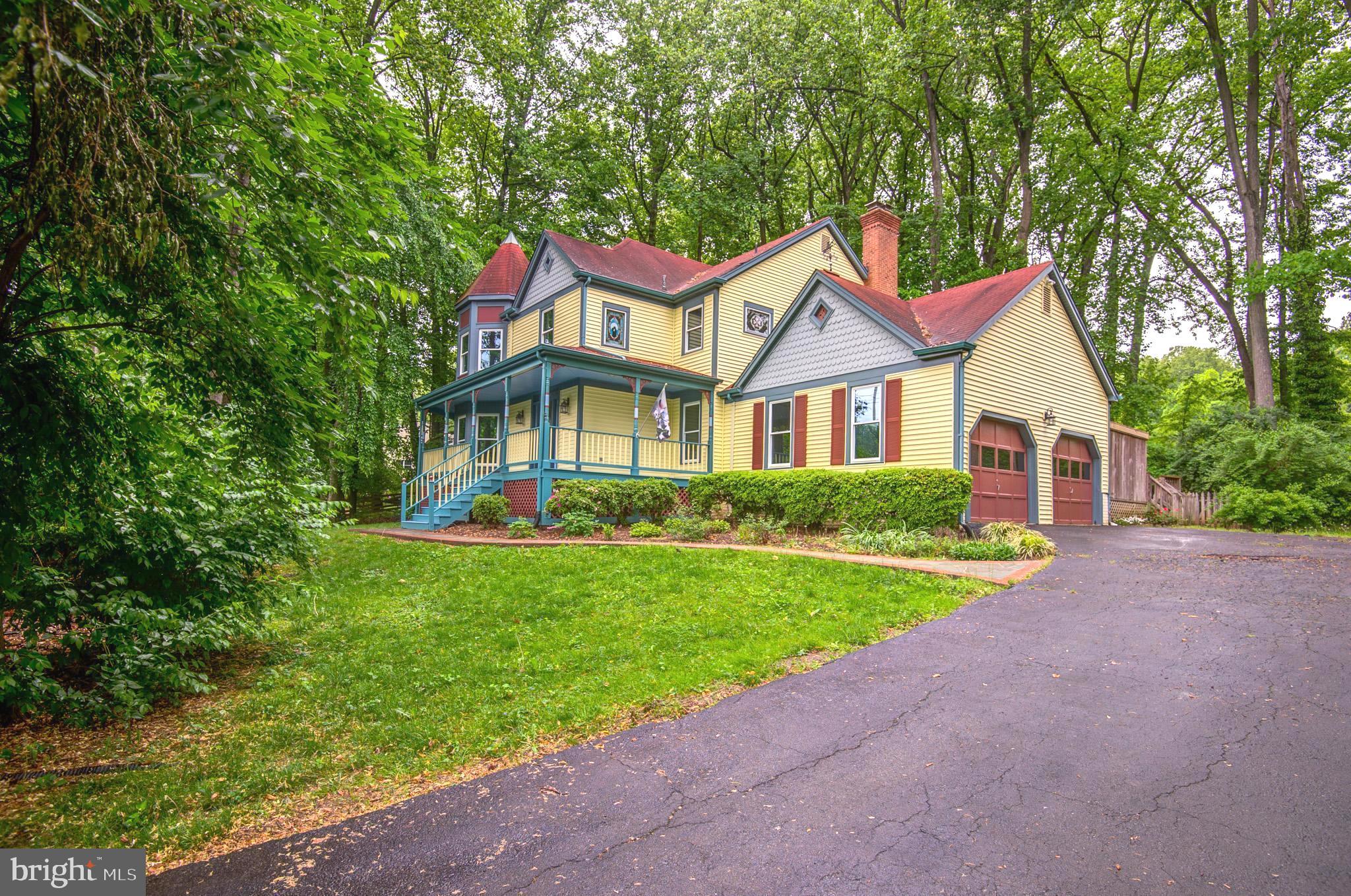 6814 Braddock Road Annandale, VA 22003 - Photo 64 of 68 a front view of a house with yard