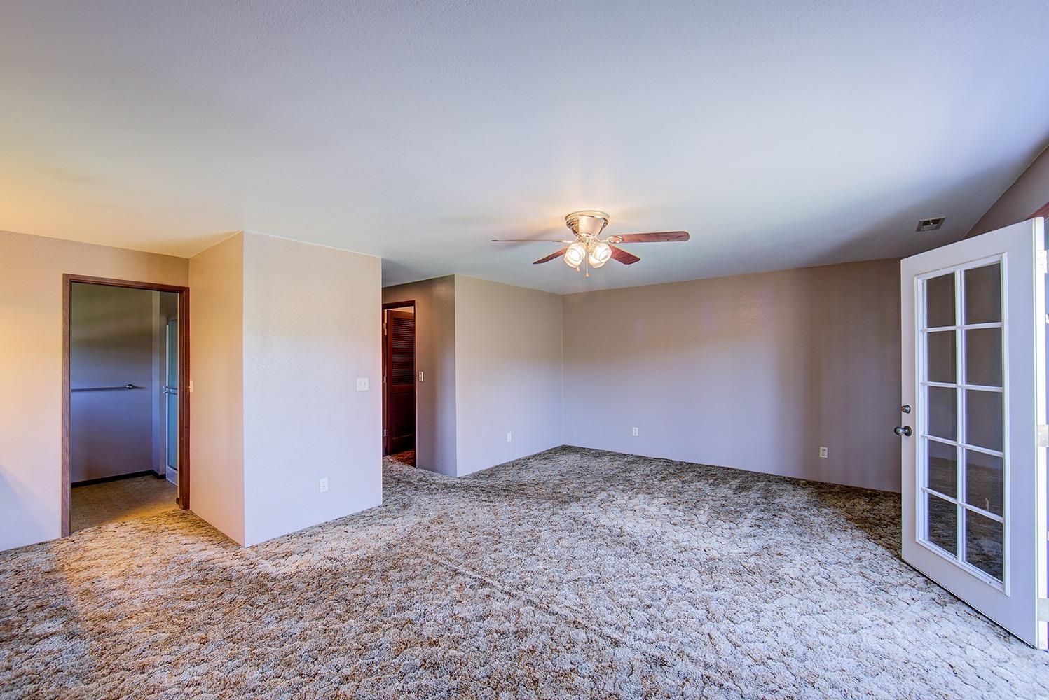 6475 Old Stage Road Central Point, OR 97502 - Photo 19 of 32 a view of an empty room with a window