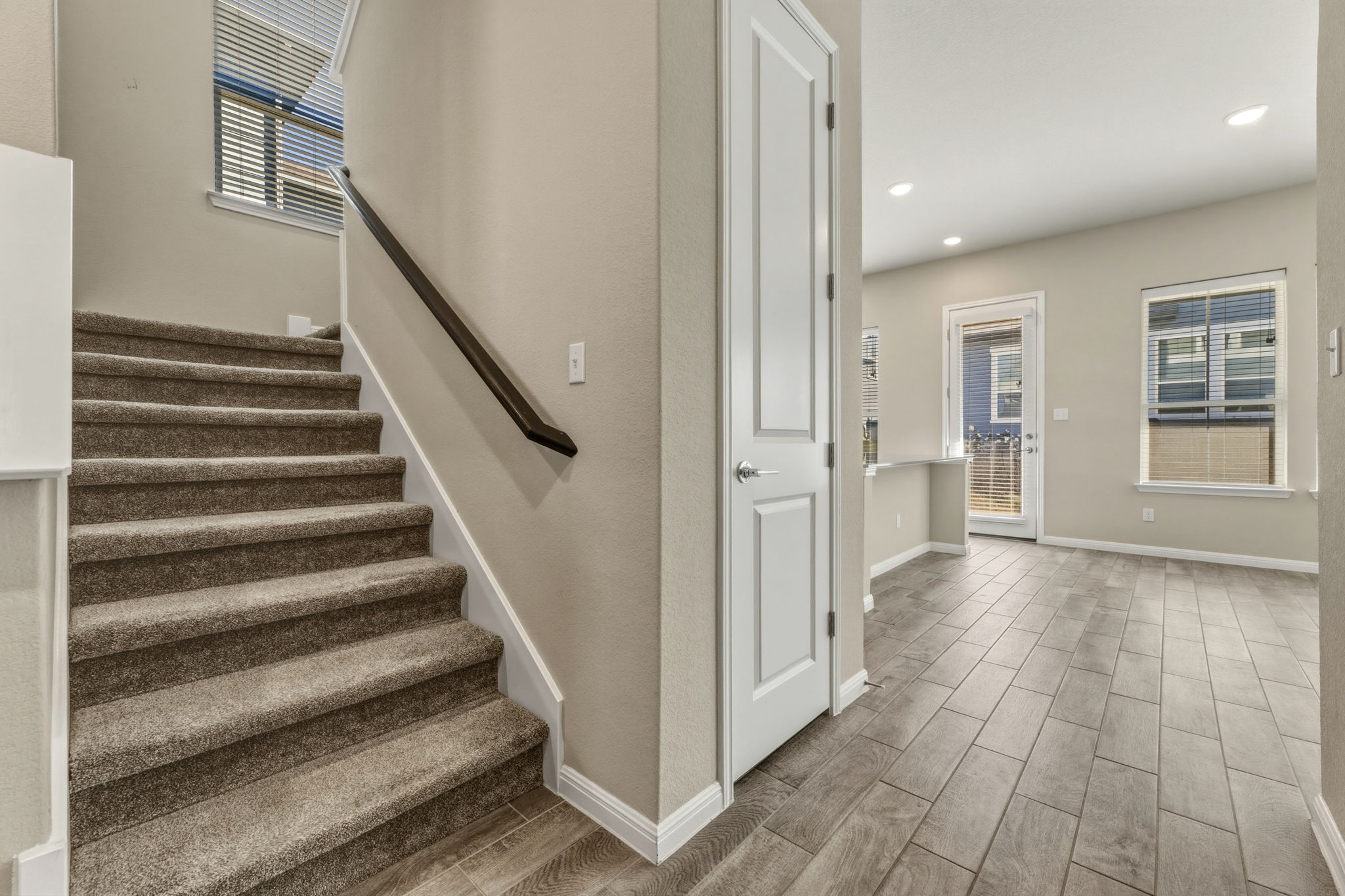 1015 Vista View Drive, Unit 2102 Georgetown, TX 78626 - Photo 16 of 40 a view of an entryway with wooden floor and stairs