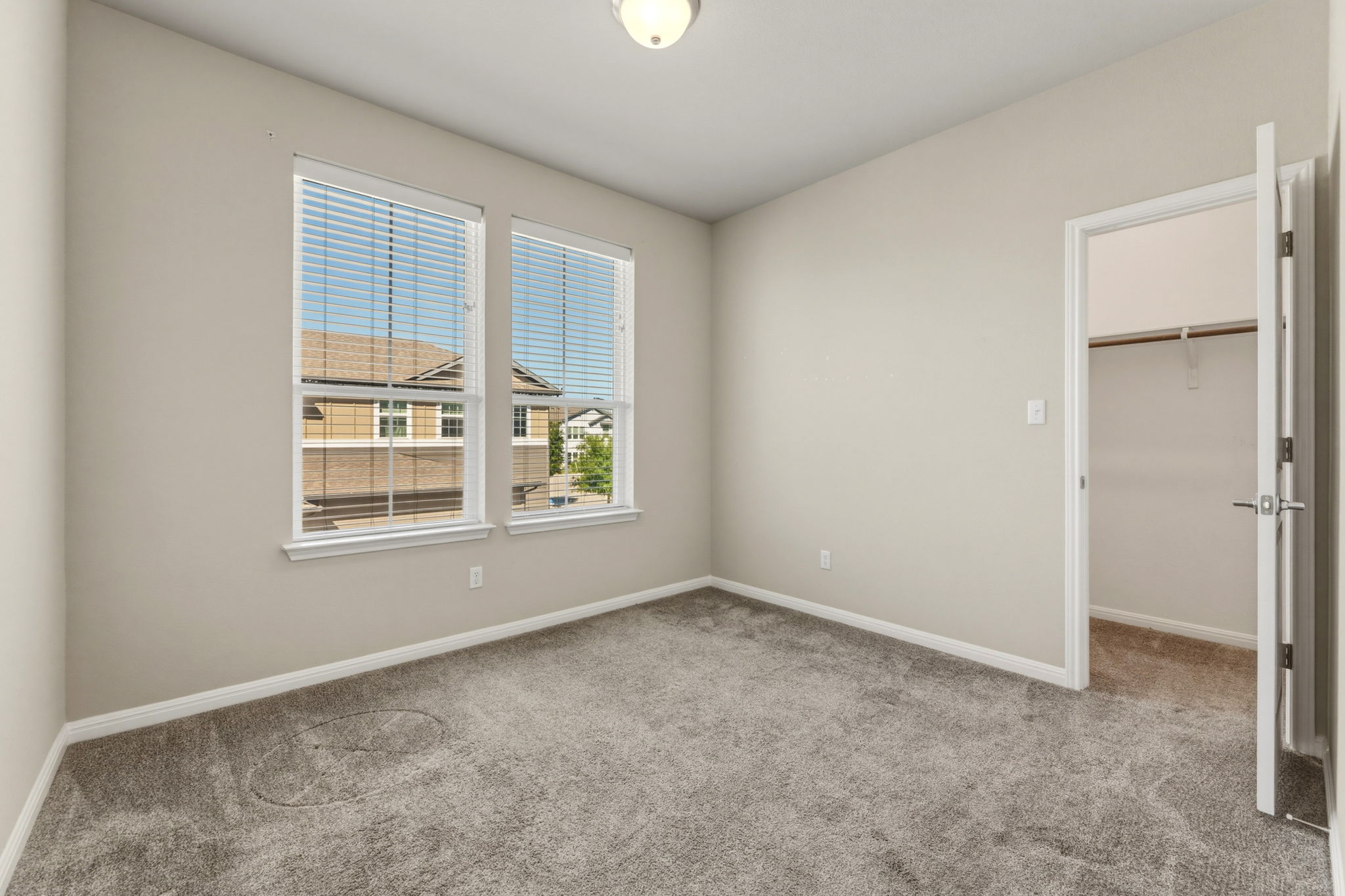 1015 Vista View Drive, Unit 2102 Georgetown, TX 78626 - Photo 26 of 40 a view of an empty room with a window
