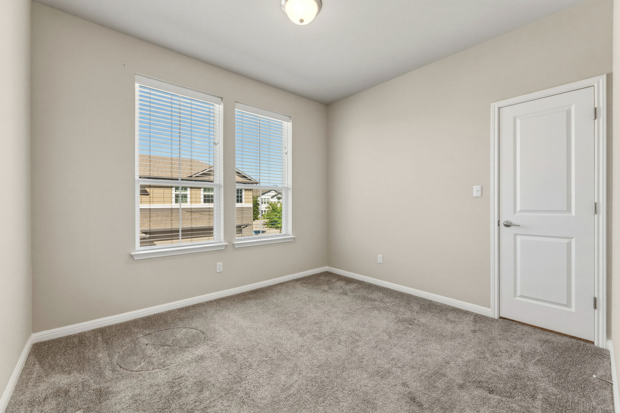 1015 Vista View Drive, Unit 2102 Georgetown, TX 78626 - Photo 27 of 40 a view of an empty room with a window