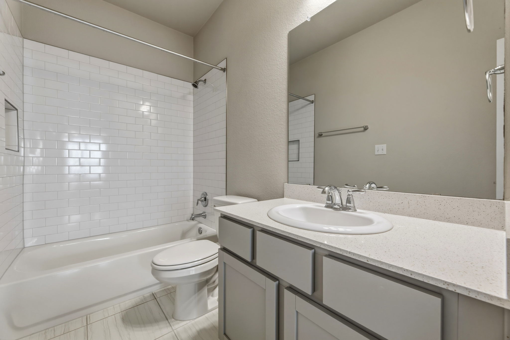 1015 Vista View Drive, Unit 2102 Georgetown, TX 78626 - Photo 29 of 40 a bathroom with a sink a toilet and shower