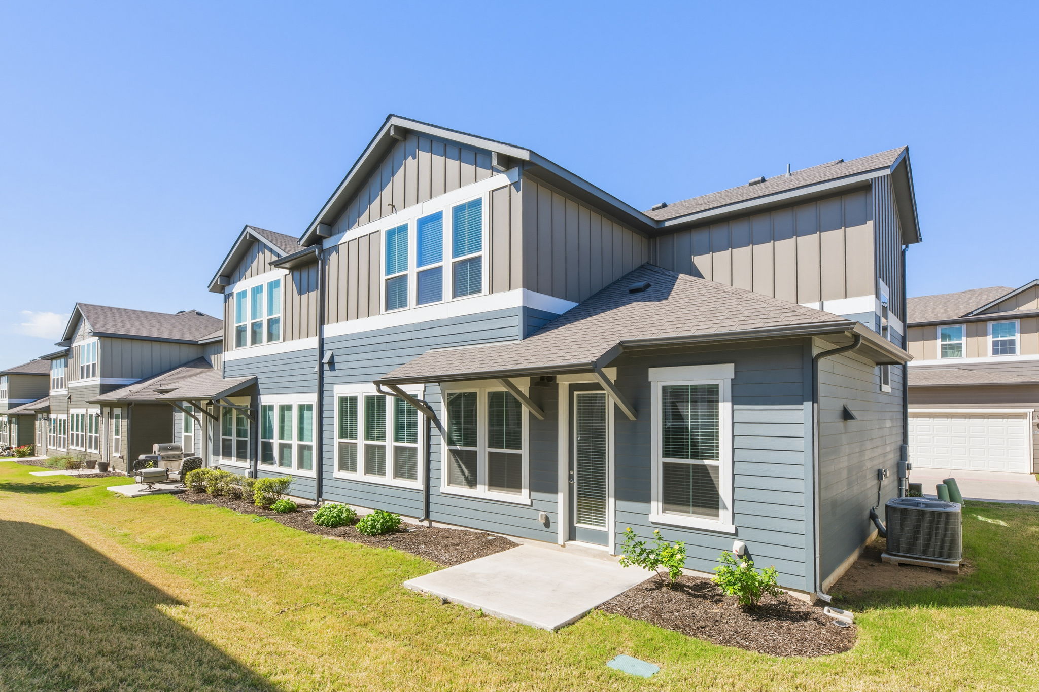 1015 Vista View Drive, Unit 2102 Georgetown, TX 78626 - Photo 36 of 40 a front view of a house with a yard