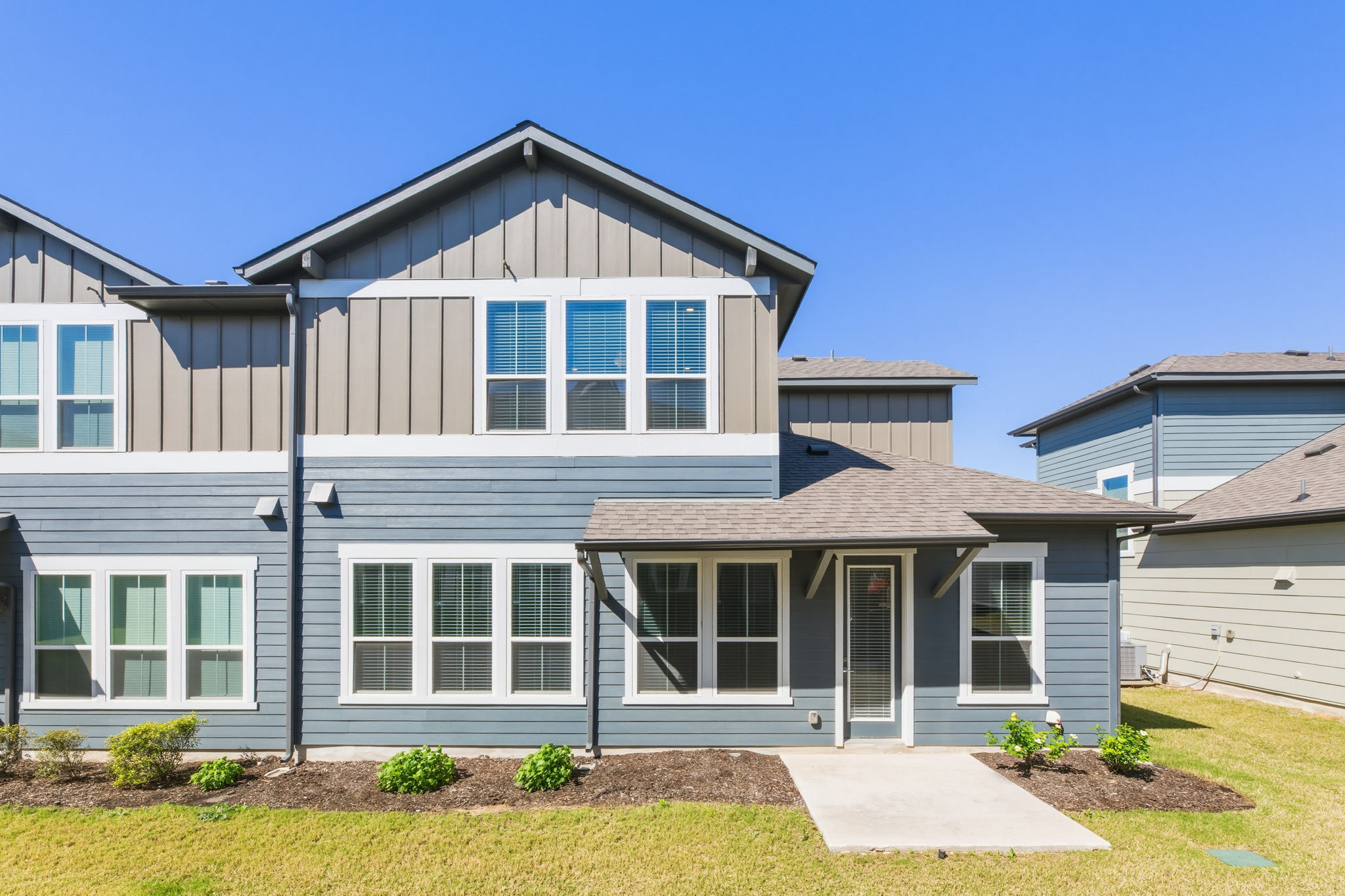 1015 Vista View Drive, Unit 2102 Georgetown, TX 78626 - Photo 37 of 40 a front view of a house with a yard