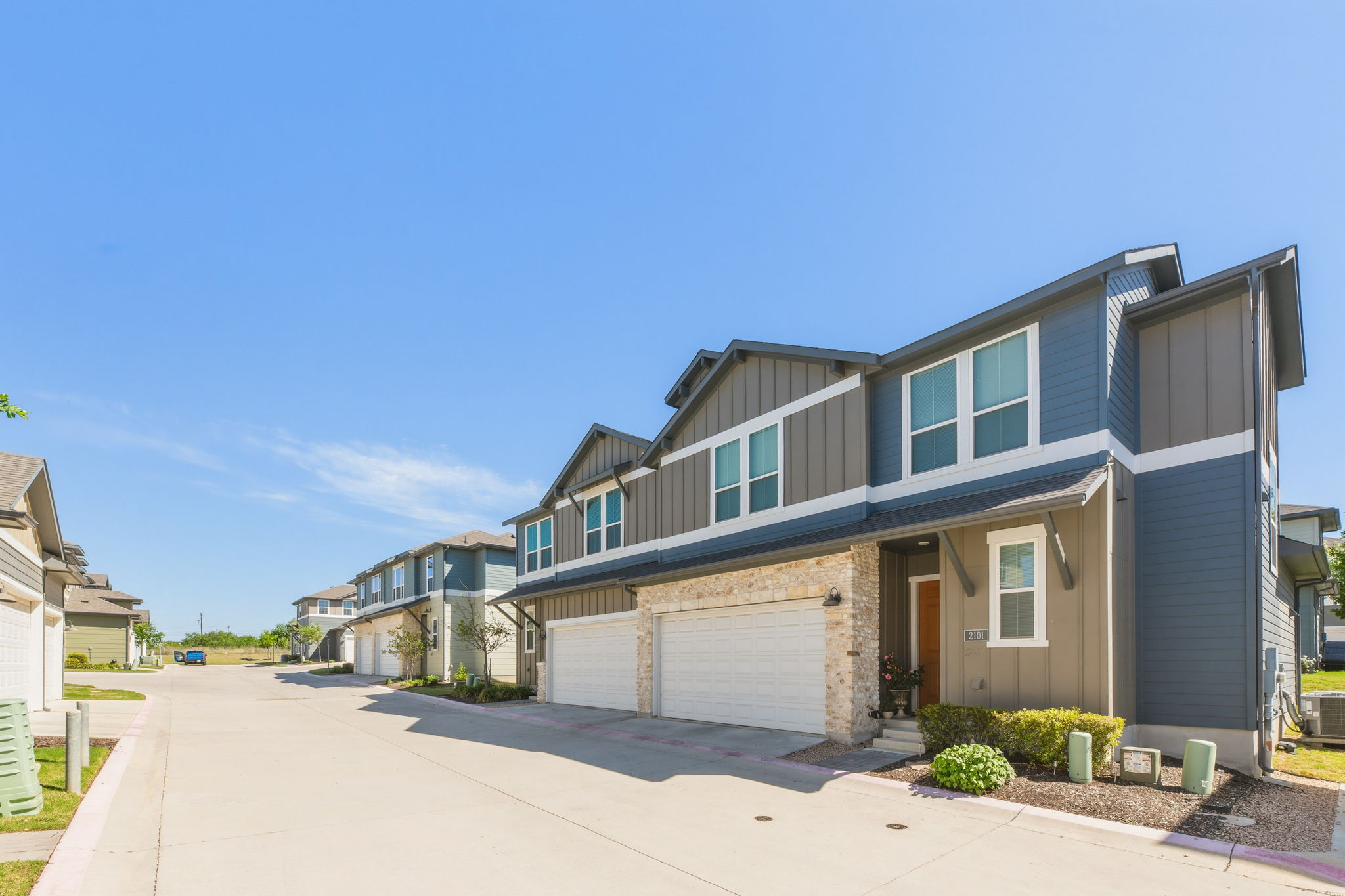 1015 Vista View Drive, Unit 2102 Georgetown, TX 78626 - Photo 5 of 40 a front view of a house with a yard