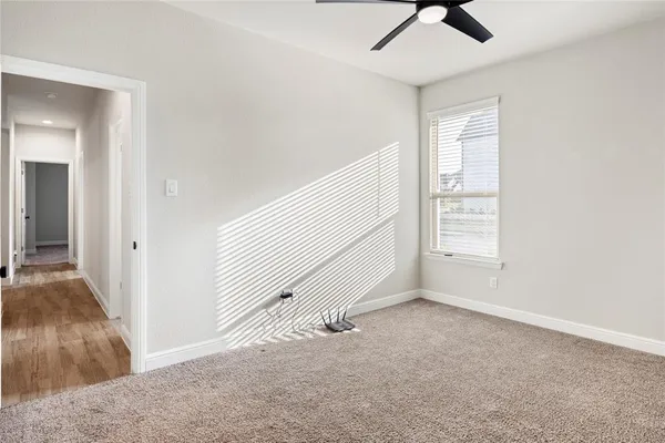 a view of a storage & utility room with two washing machine