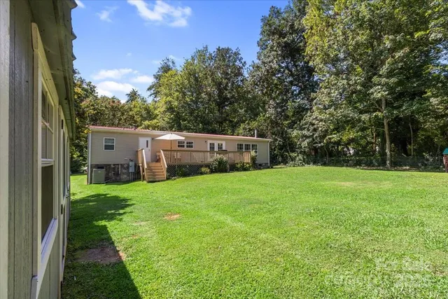 a view of a backyard with a garden