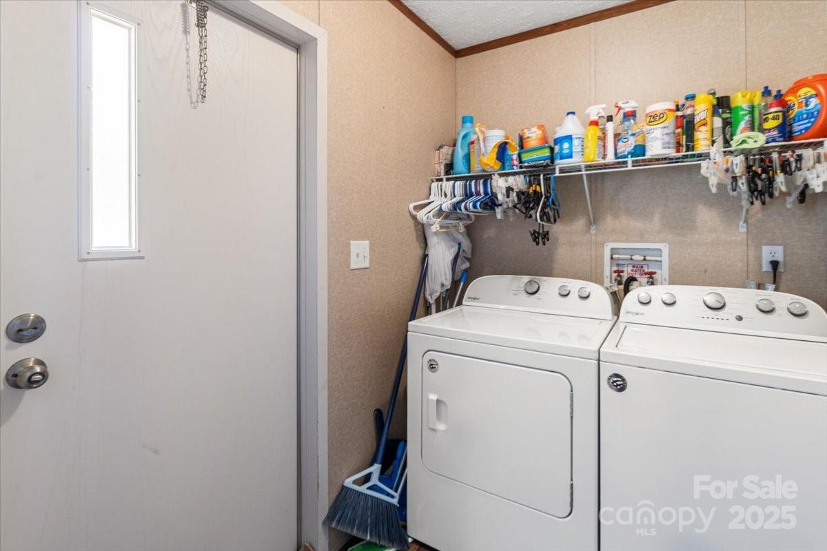 132 Bailey Mountain Road Mars Hill, NC 28754 - Photo 33 of 33 a utility room with dryer and washer