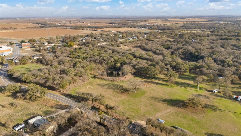 223 West Gaithings Covington, TX 76636 - Photo 3 of 22 Aerial view of property and surrounding area with rural landscape