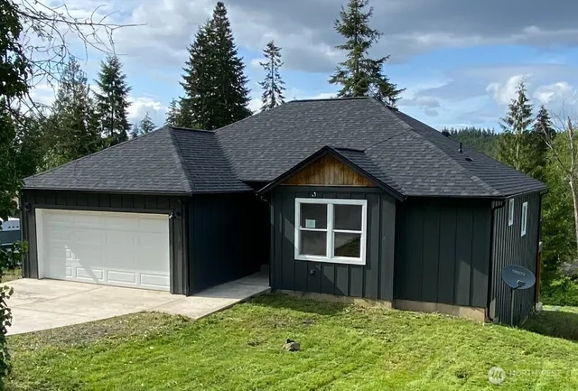 a house with yard in front of it