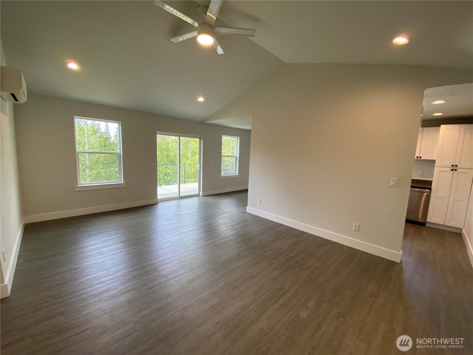 118 Timberline Drive Castle Rock, WA 98611 - Photo 20 of 23 an empty room with wooden floor and a window