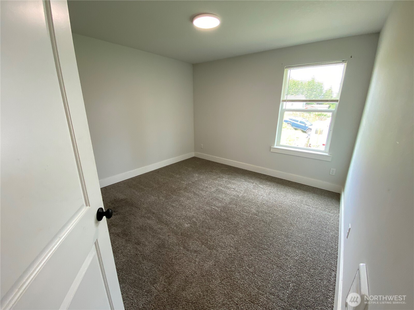 118 Timberline Drive Castle Rock, WA 98611 - Photo 10 of 23 an empty room with windows