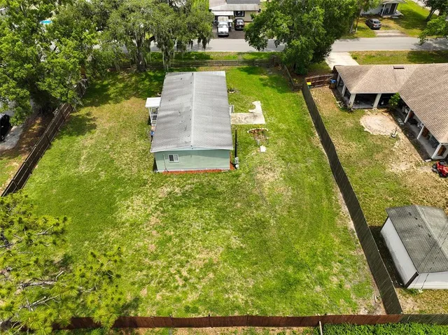 a swimming pool with yard