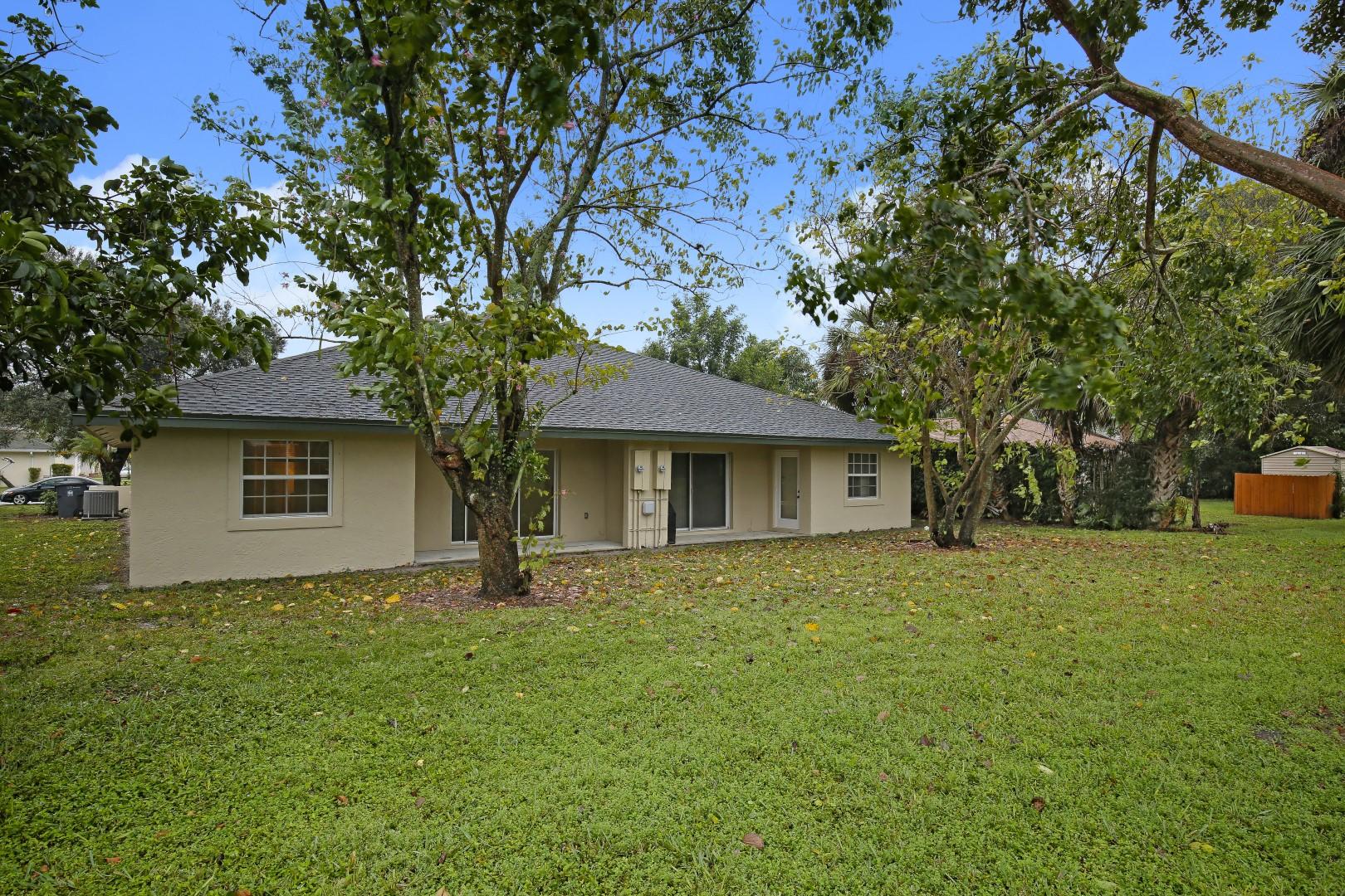 1236 Block Island Road Wellington, FL 33414 - Photo 18 of 20 Exterior Rear