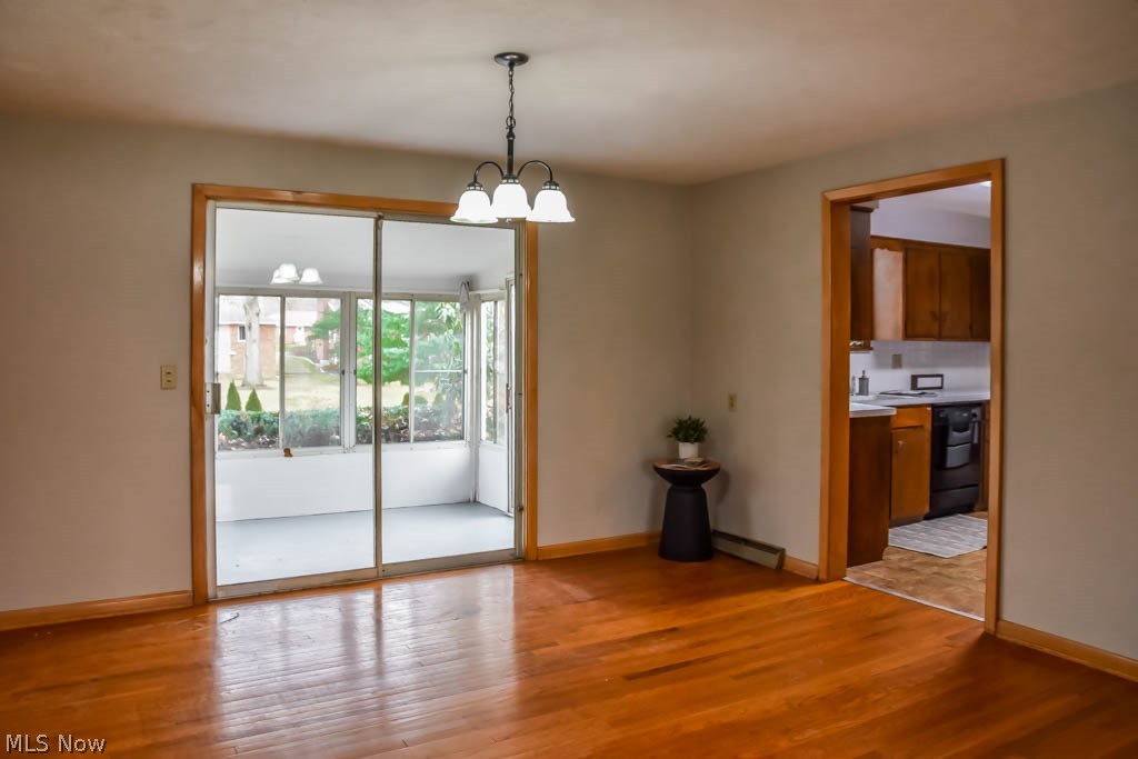 3525 25th Street Northwest Canton, OH 44708 - Photo 3 of 29 Dining room opens to back enclosed porch