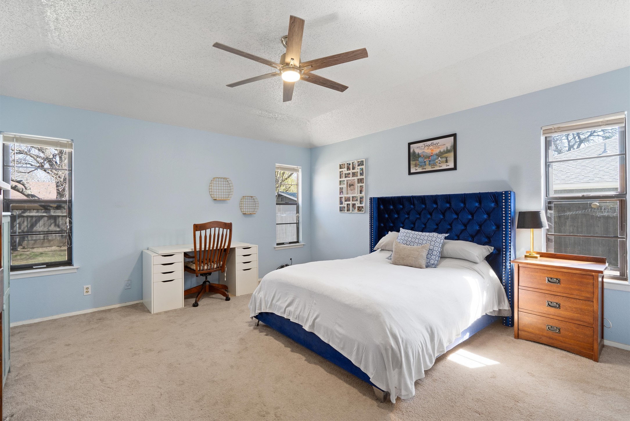 3309 Buffalo Springs Trail Georgetown, TX 78628 - Photo 18 of 36 a bedroom with a bed dresser and a window