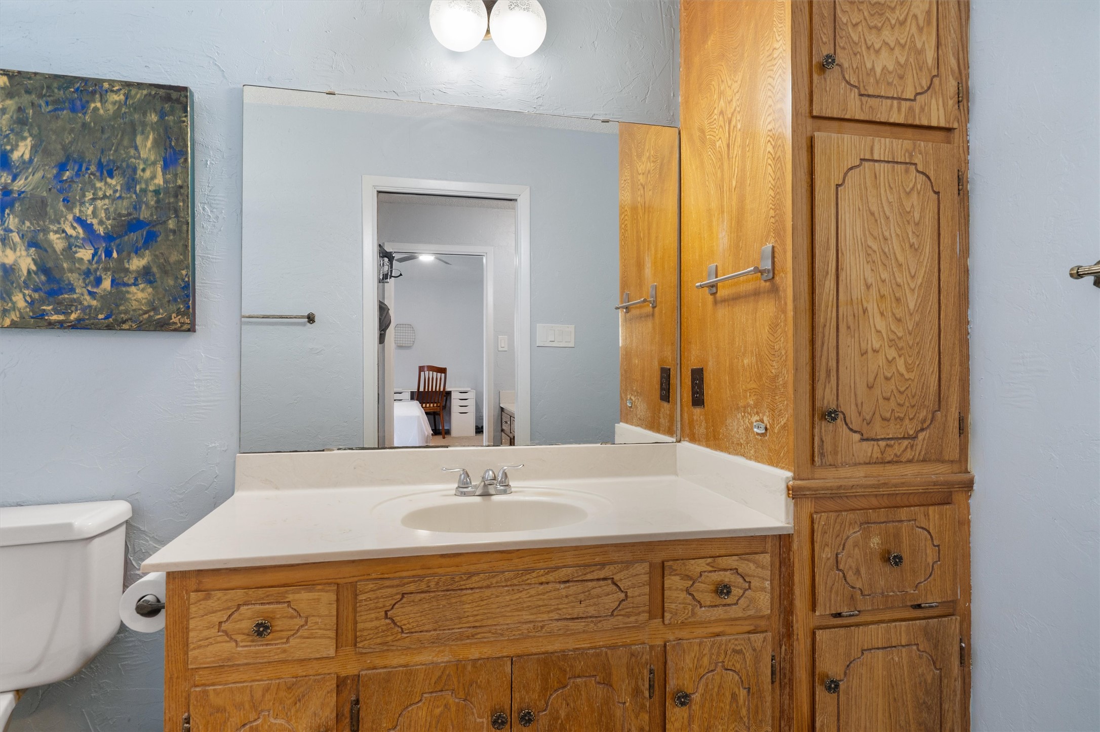 3309 Buffalo Springs Trail Georgetown, TX 78628 - Photo 21 of 36 a bathroom with a sink and a mirror