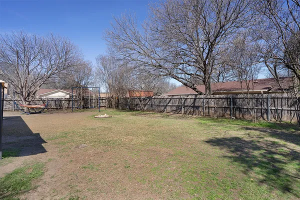 a view of yard with trees
