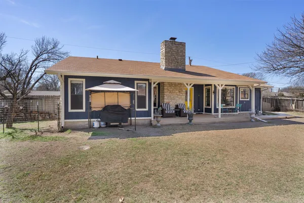 a front view of a house with a patio