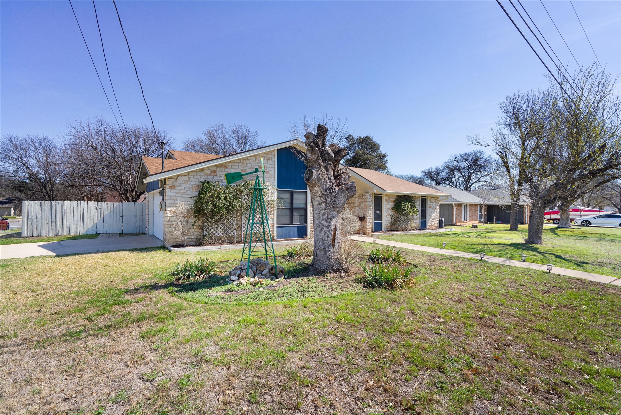 3309 Buffalo Springs Trail Georgetown, TX 78628 - Photo 4 of 36 a front view of a house with a yard and garage