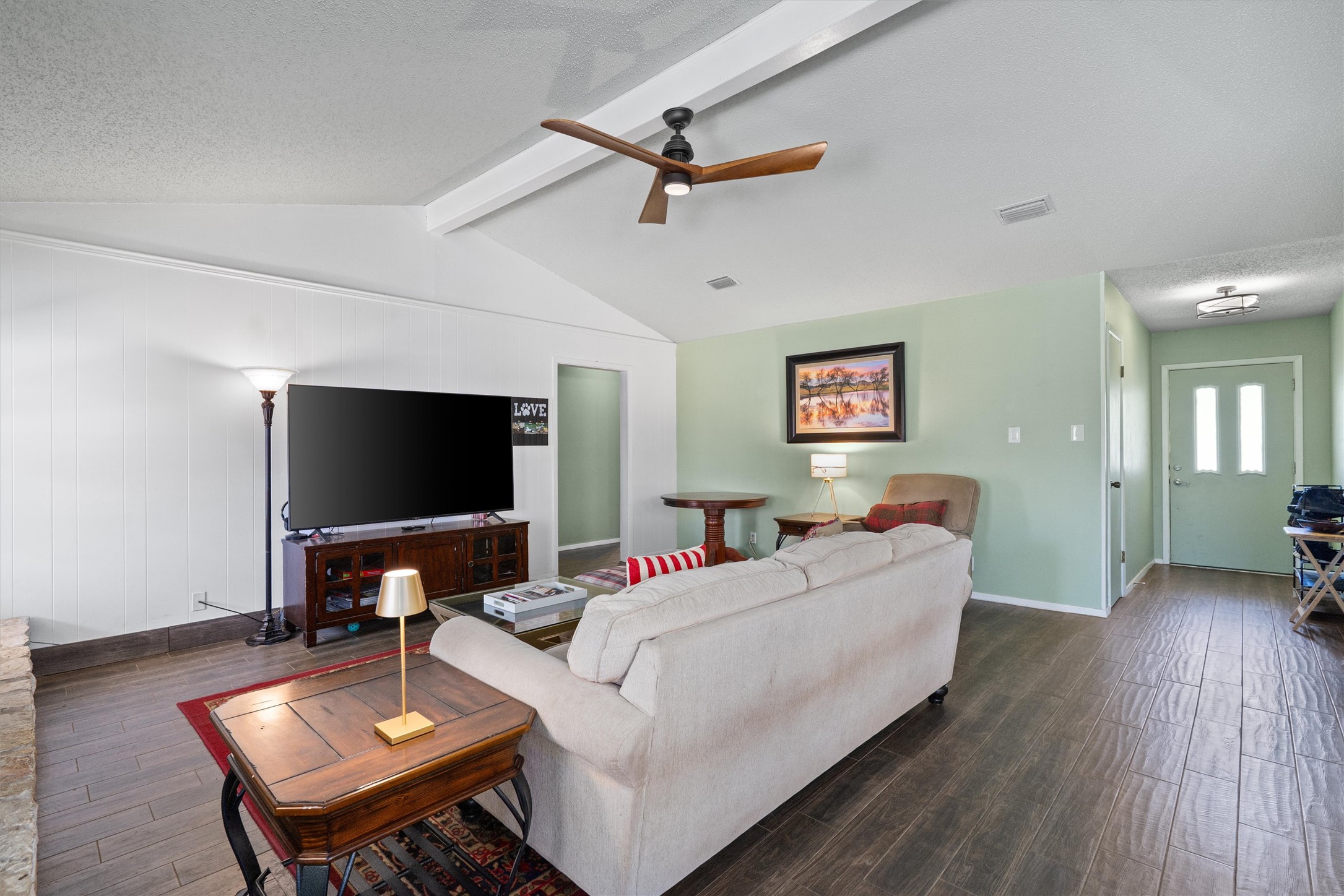3309 Buffalo Springs Trail Georgetown, TX 78628 - Photo 7 of 36 a living room with furniture and a flat screen tv