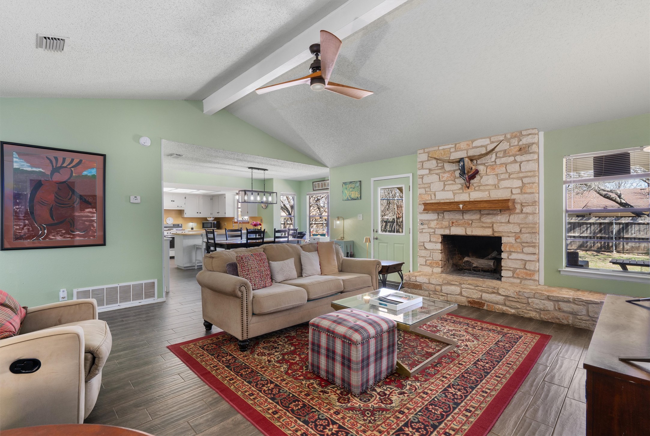 3309 Buffalo Springs Trail Georgetown, TX 78628 - Photo 10 of 36 a living room with furniture and a fireplace