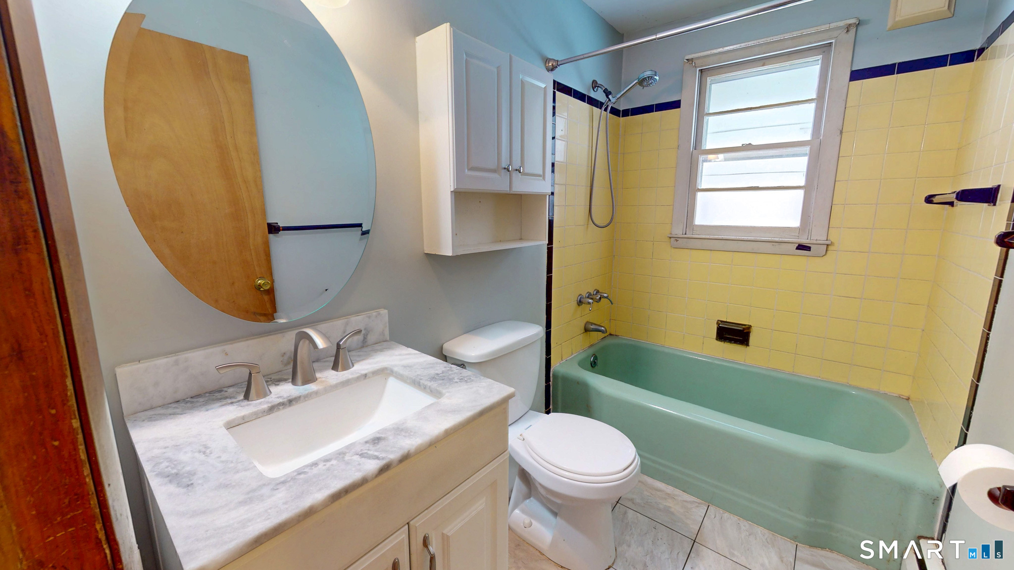 19 Plaza Street Brooklyn, CT 06234 - Photo 21 of 33 a bathroom with a granite countertop sink toilet and shower