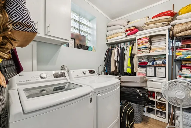 a utility room with dryer and washer