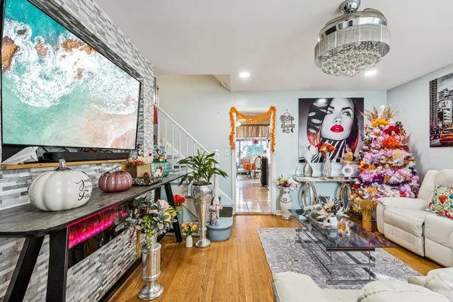 a very nice looking living room with furniture and a rug