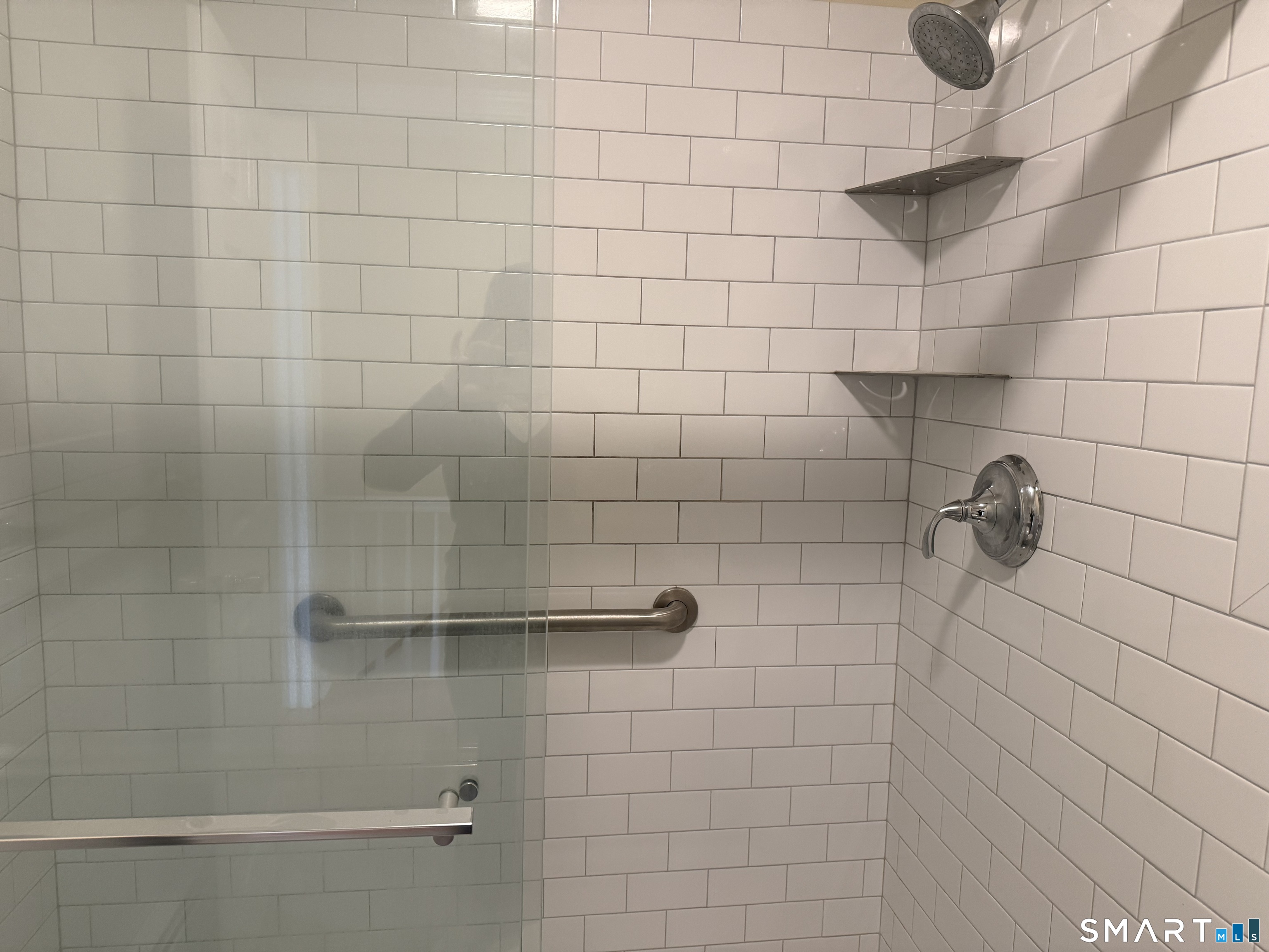 116 Commerce Street, Unit 5 Clinton, CT 06413 - Photo 15 of 18 a bathroom with a shower
