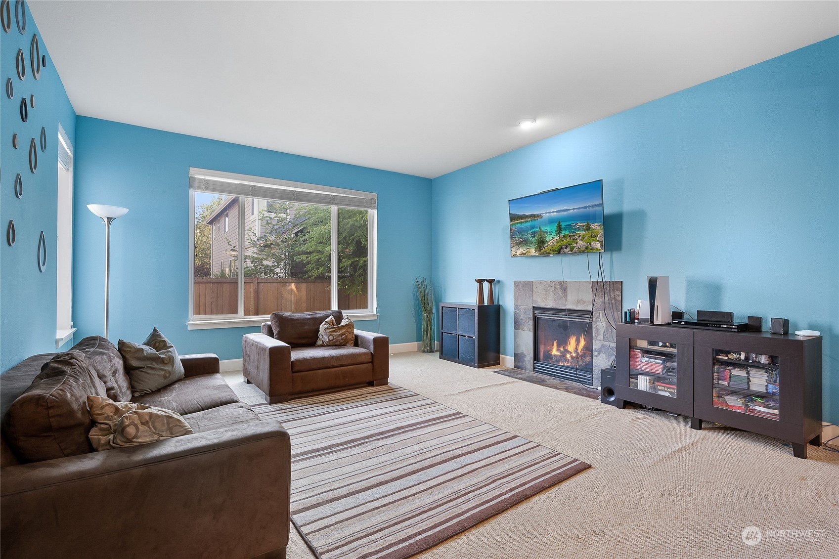 3412 171st Place Southeast Bothell, WA 98012 - Photo 12 of 40 a living room with furniture and a fireplace