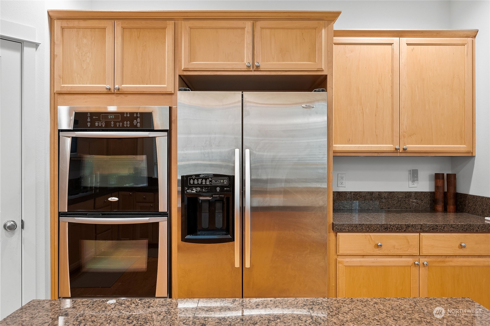 3412 171st Place Southeast Bothell, WA 98012 - Photo 16 of 40 a kitchen with granite countertop a refrigerator and a sink