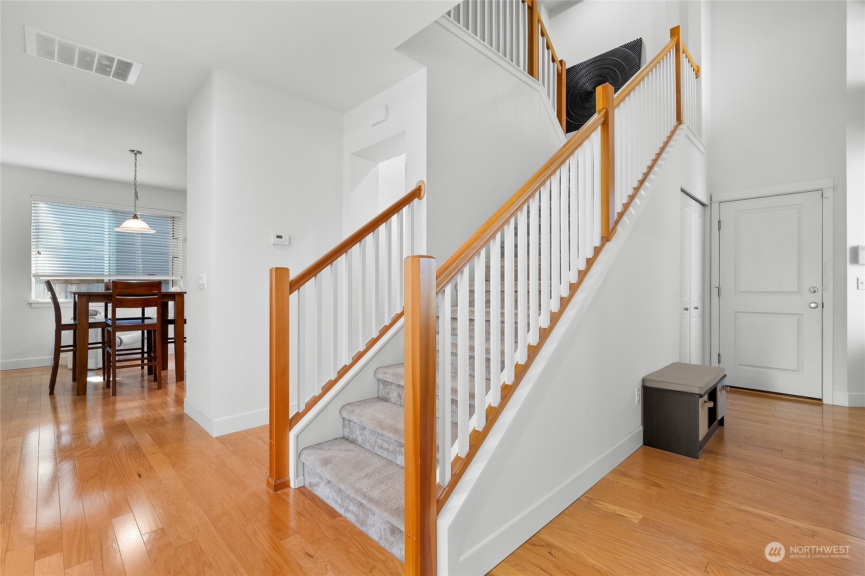 3412 171st Place Southeast Bothell, WA 98012 - Photo 20 of 40 a view of entryway and hall with wooden floor