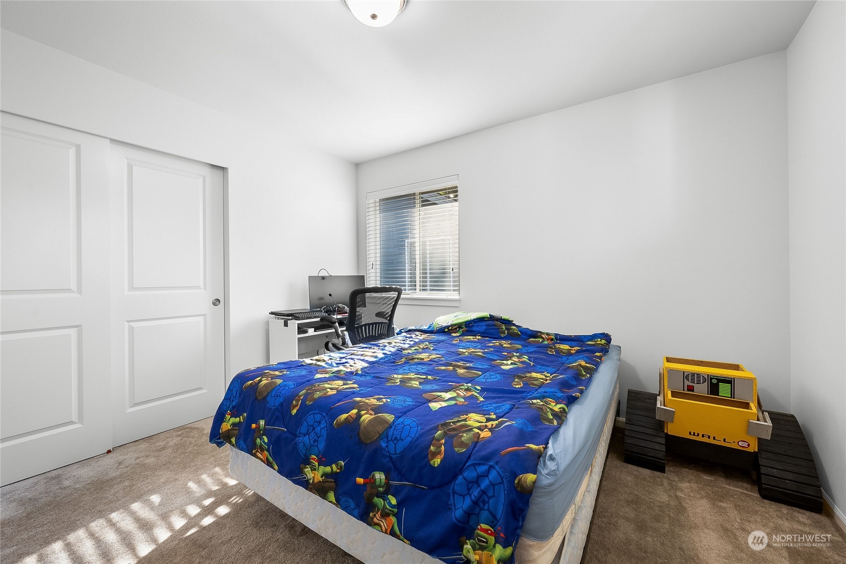 3412 171st Place Southeast Bothell, WA 98012 - Photo 24 of 40 a bedroom with a bed and a window