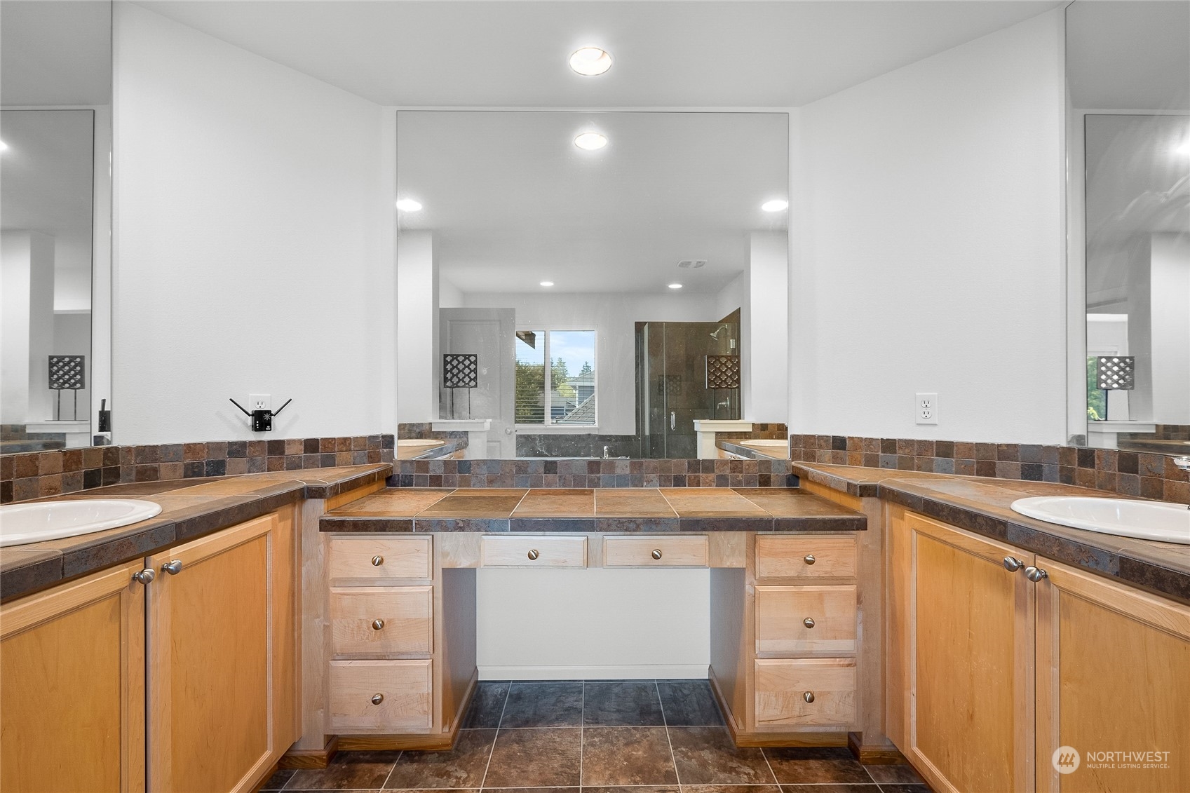 3412 171st Place Southeast Bothell, WA 98012 - Photo 35 of 40 a kitchen with a sink stove and cabinets