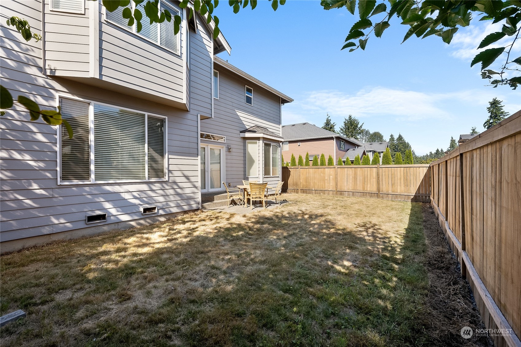 3412 171st Place Southeast Bothell, WA 98012 - Photo 37 of 40 a view of a house with backyard and sitting area