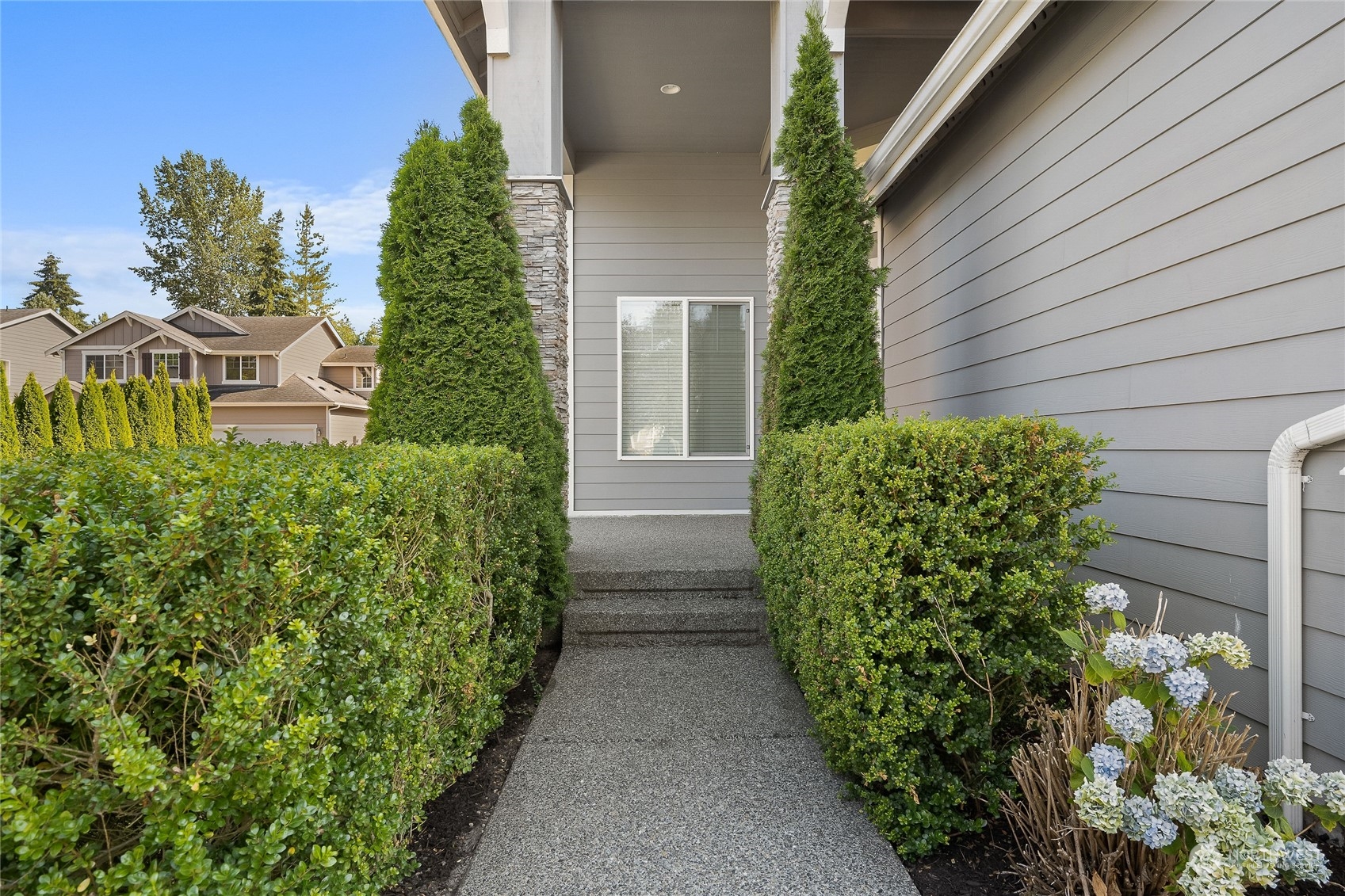 3412 171st Place Southeast Bothell, WA 98012 - Photo 4 of 40 a view of house with garden