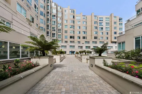 a view of multi story residential apartment building