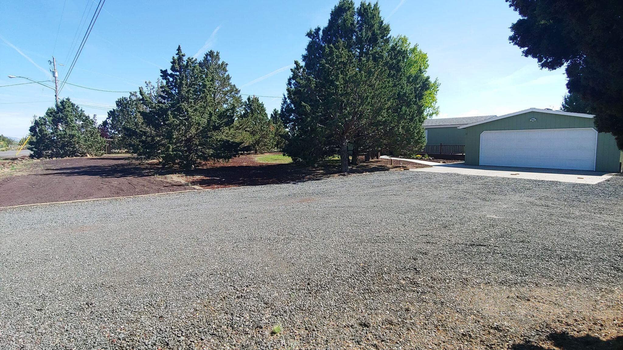 5875 Southwest Rim Road Terrebonne, OR 97760 - Photo 3 of 32 Front of Home Facing West