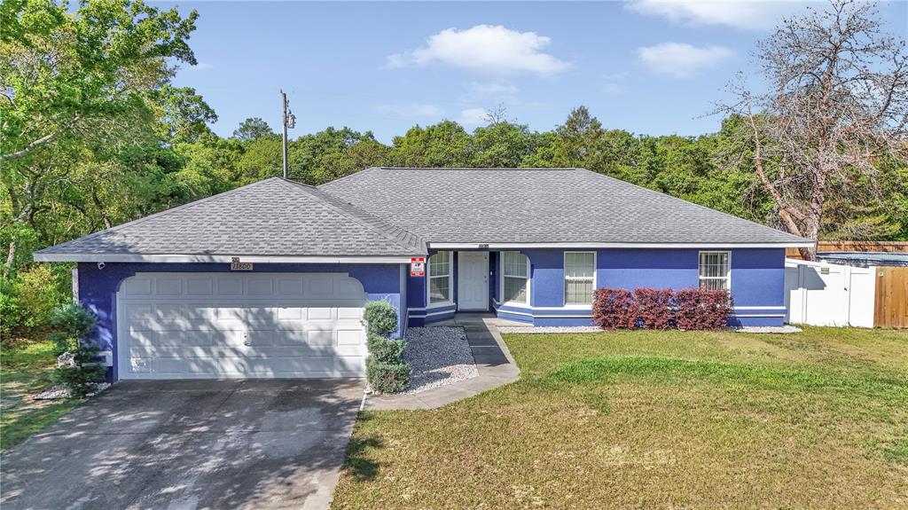 front view of a house with a yard