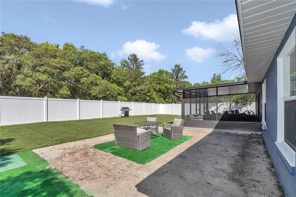 13800 Southwest 33rd Court Road Ocala, FL 34473 - Photo 11 of 42 a view of a backyard with sitting area