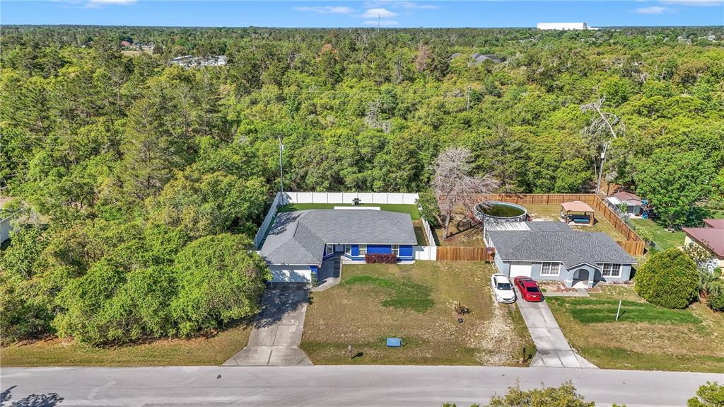 13800 Southwest 33rd Court Road Ocala, FL 34473 - Photo 15 of 42 an aerial view of a house with a yard