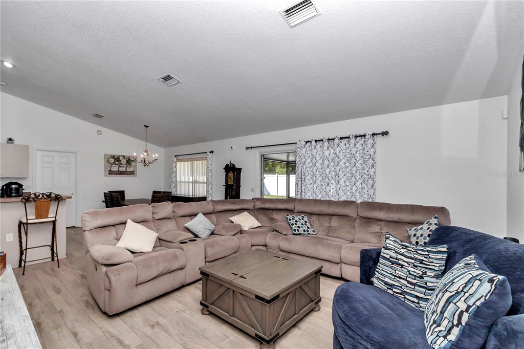 13800 Southwest 33rd Court Road Ocala, FL 34473 - Photo 18 of 42 a living room with furniture and a couch
